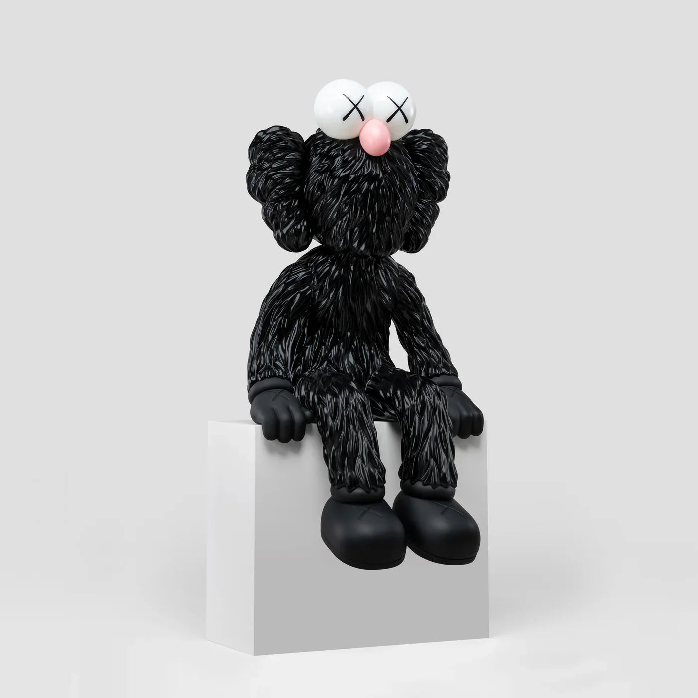 KAWS SEEING Black Alloy Sculpture with blue LED eyes lighting up. Verified condition by Art Trader. Side view of heavy metal art toy.-3