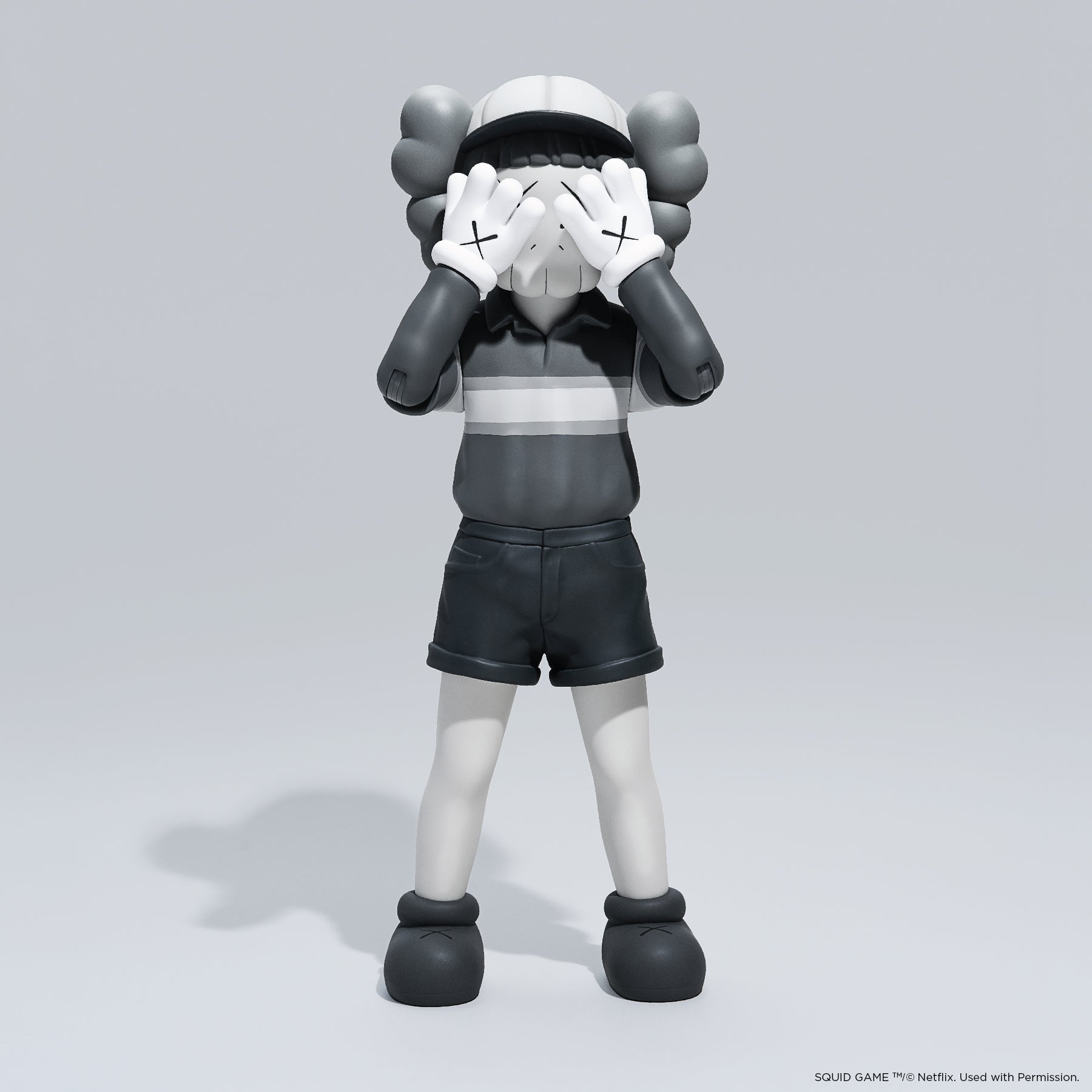 KAWS Chul-Su Monotone Grey Vinyl Figure 2025. Side profile showing NFC tag capability. Authentic art toy verified by Art Trader.-2