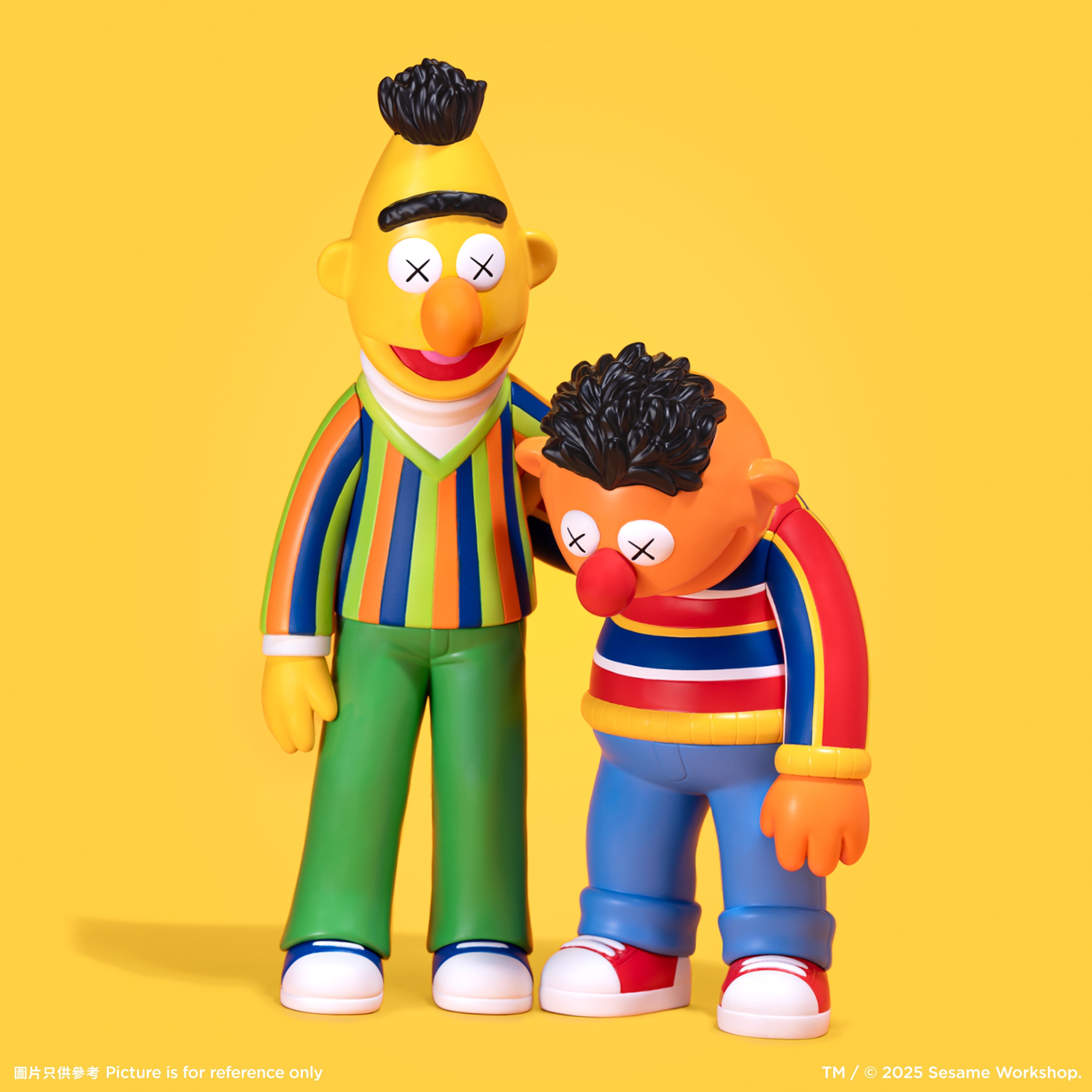 KAWS Bert and Ernie Sesame Street 2025 vinyl figures standing together. Bert in striped sweater and Ernie in orange shirt. NFC verified set by Art Trader.