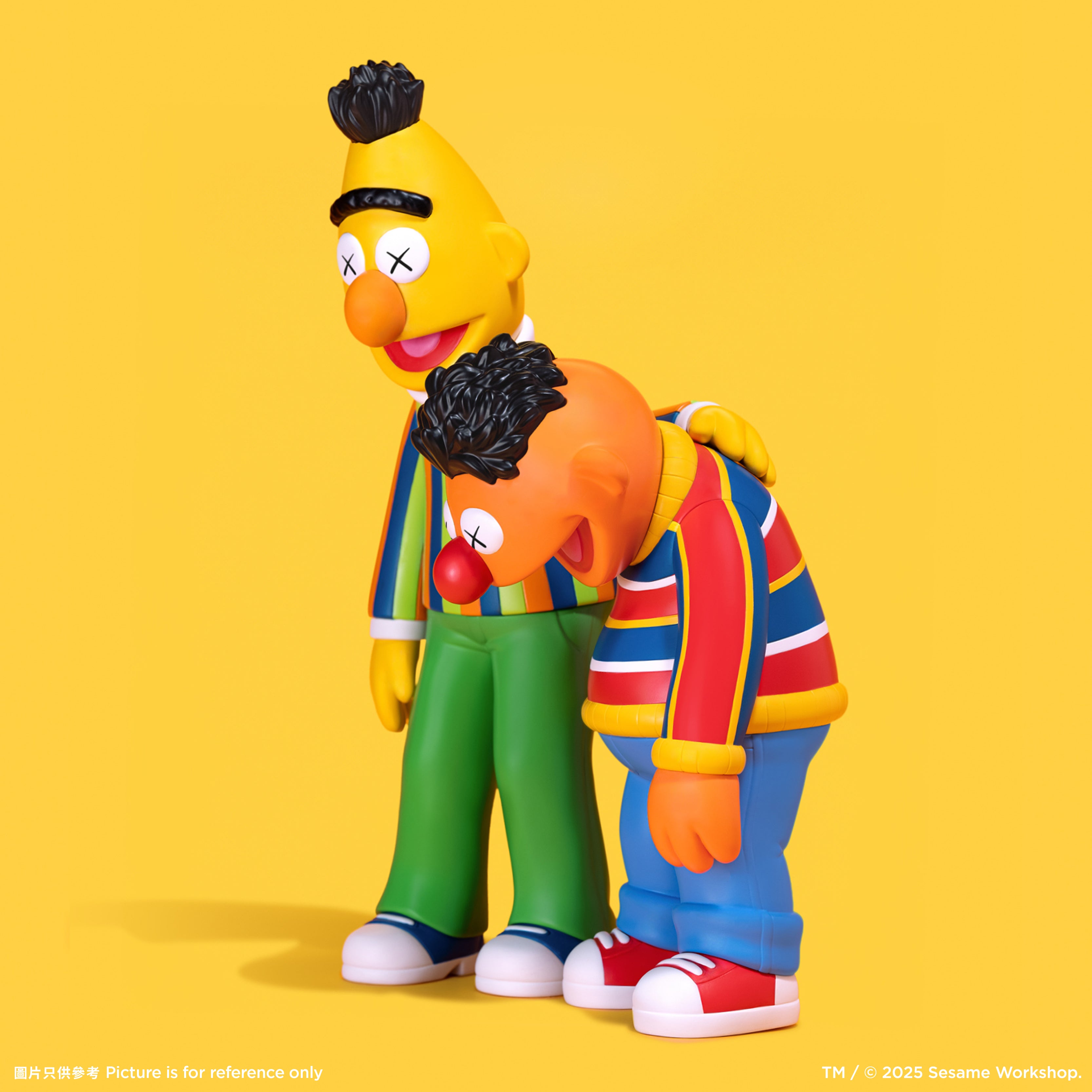 KAWS Bert and Ernie Sesame Street 2025 vinyl figures standing together. Bert in striped sweater and Ernie in orange shirt. NFC verified set by Art Trader.-2