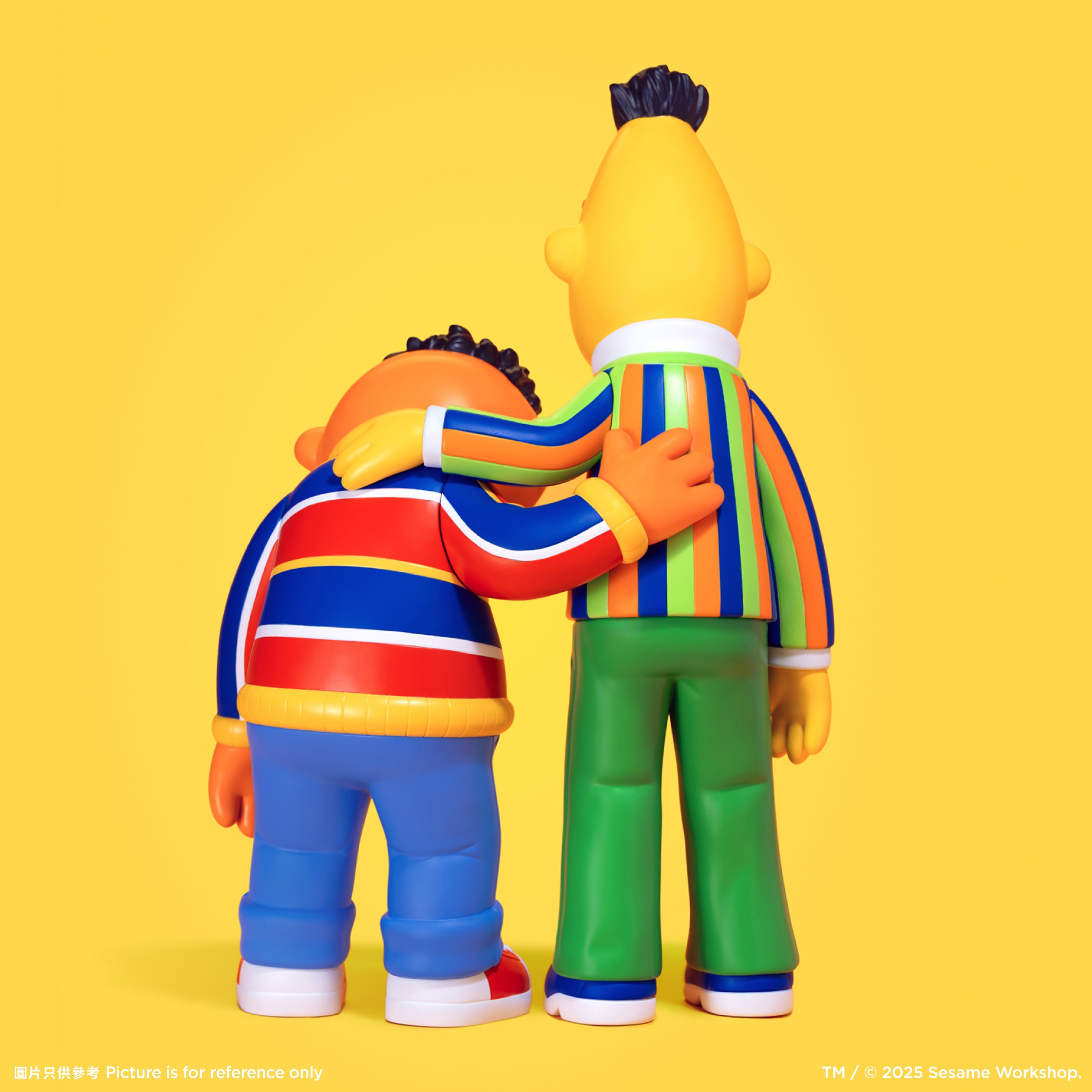 KAWS Bert and Ernie Sesame Street 2025 vinyl figures standing together. Bert in striped sweater and Ernie in orange shirt. NFC verified set by Art Trader.-3
